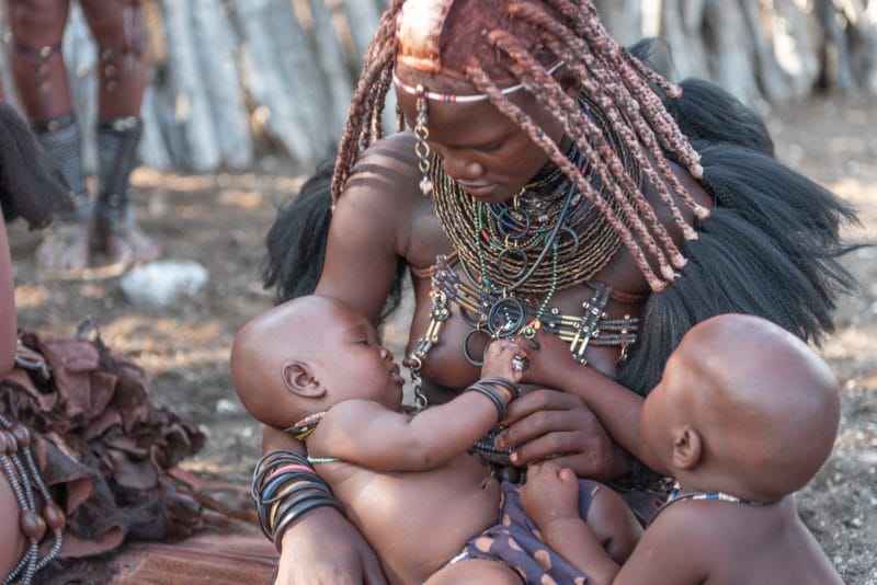 Himba woman and her children