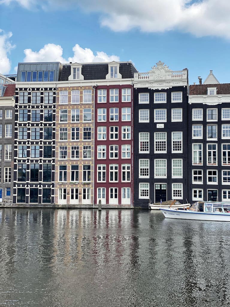 Damrak is a must see when visiting Amsterdam for the first time